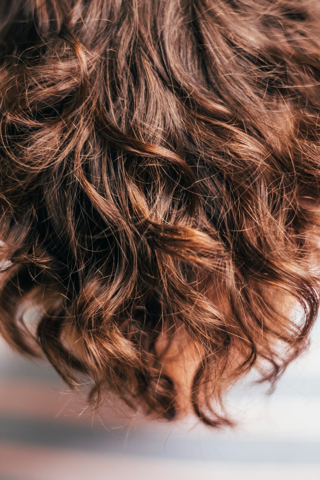 Postpartum hair loss is common, but when does it stop? Learn the causes, timeline, and how to care for your hair during recovery after childbirth.